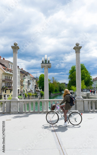 young pretty woman on The Cobblers' Bridge, beautiful old city L