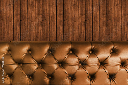 Obraz na plátně background with dark brown  leather seat and dark w