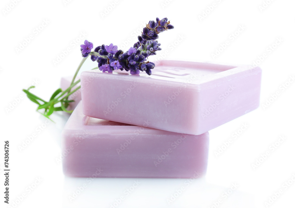 Naklejka premium Bars of natural soap with fresh lavender isolated on white