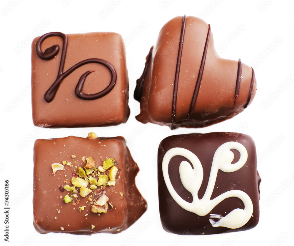 Obraz premium Delicious chocolate candy isolated on white