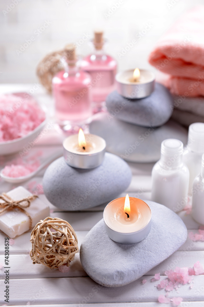 Composition of spa treatment on table on white background