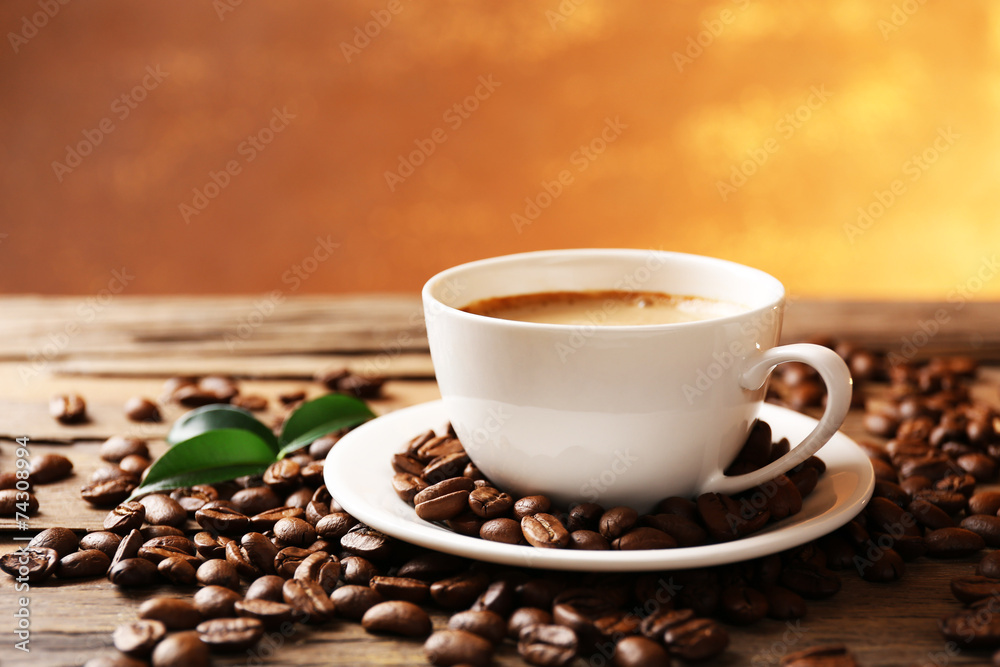 Cup of coffee on wooden table Cup of coffee on wooden table