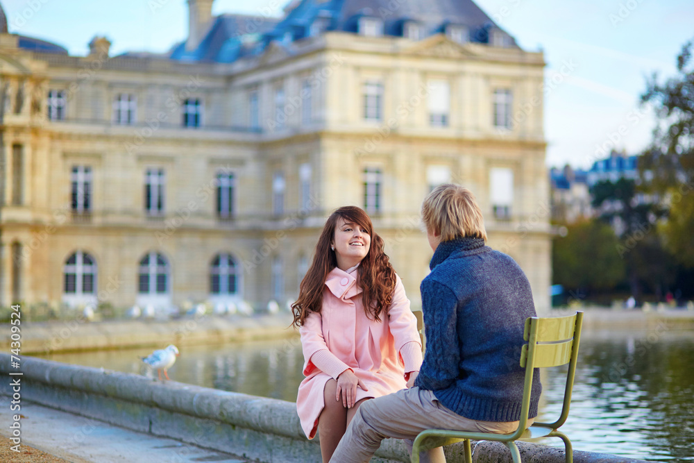 Happy young couple having a date in Paris Happy young couple having a date in Paris