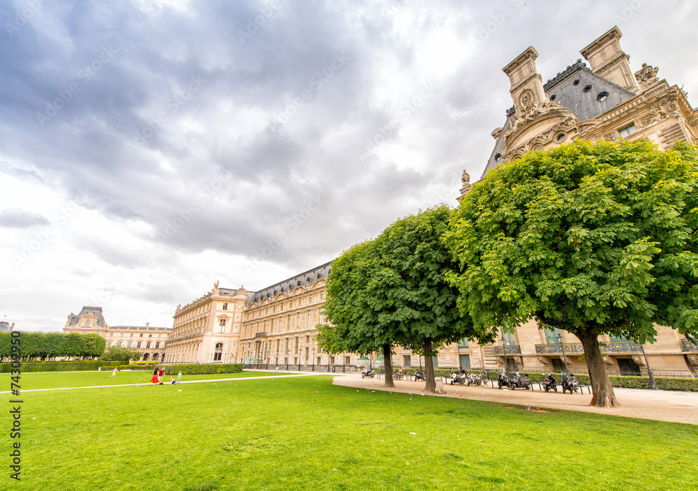 PARIS - JUNE 15, 2014: Tourists in Tuileries Gardens on a summer