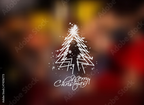 Christmas tree in the blur background with space for text