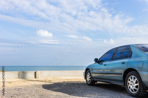 Car parked on the beach © dearzdearzz