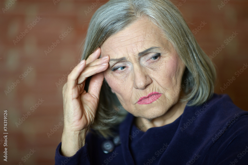thinking elderly woman