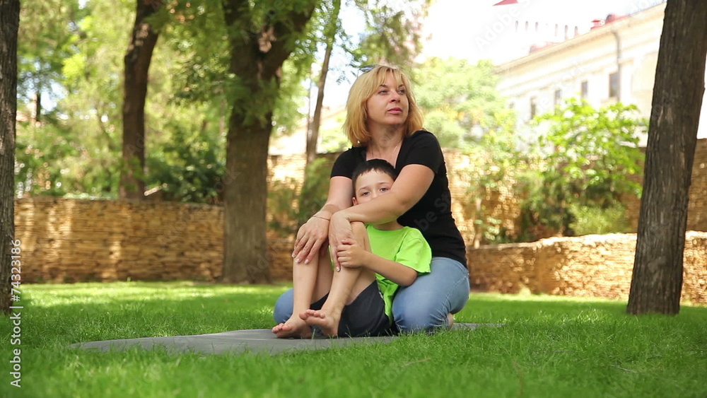 mother and son having fun in the park 3