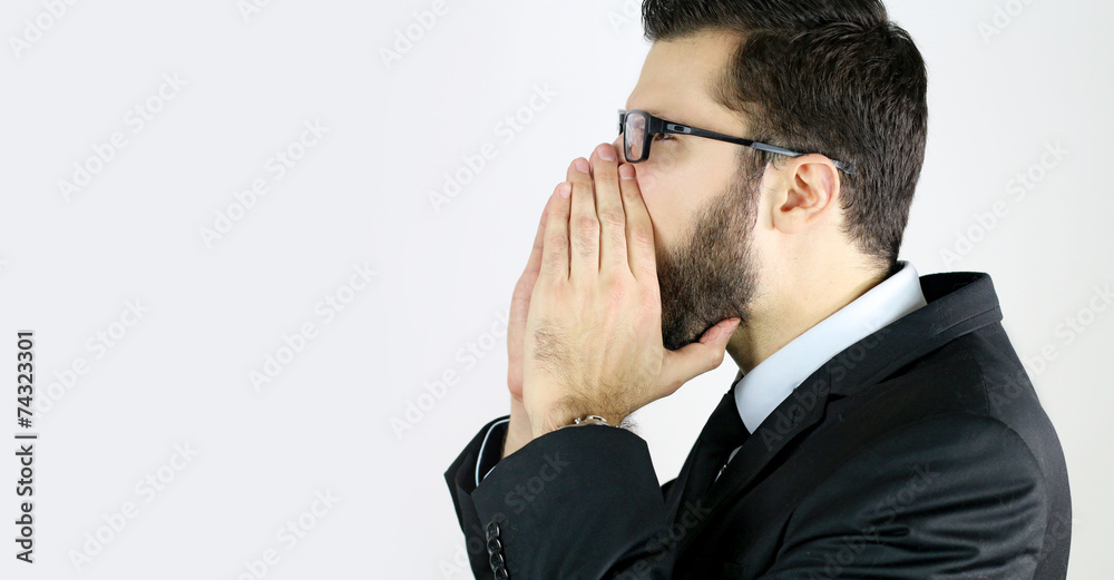businessman screaming on a white background businessman screaming on a white background