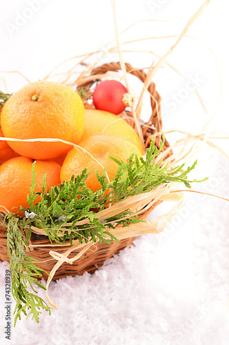Christmas tangerines in a basket on christmas