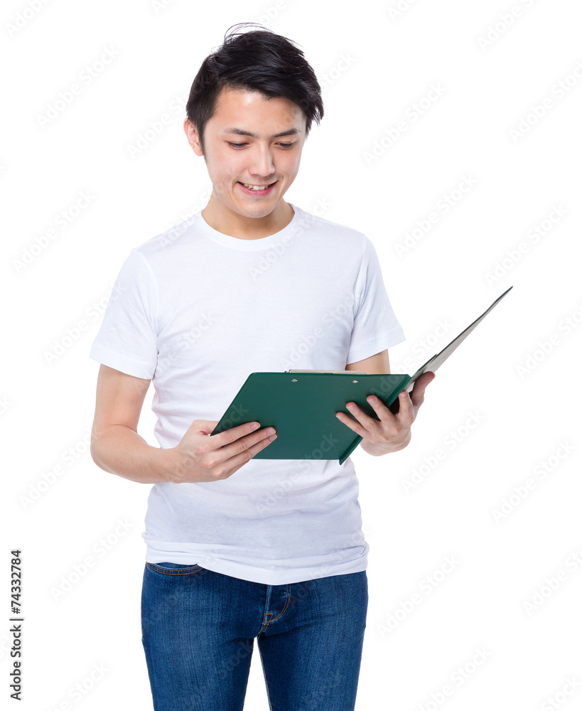 Man look at clipboard Man look at clipboard