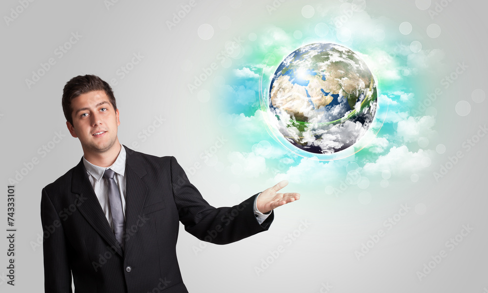 Young man with earth and cloud concept Young man with earth and cloud concept
