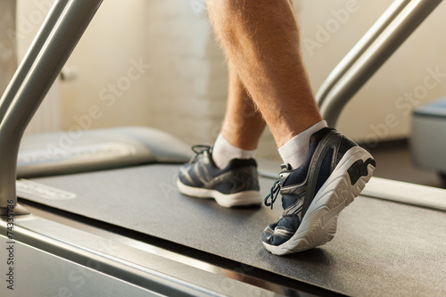 Photo Exercising on treadmill.