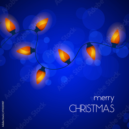 Christmas lights on blue background