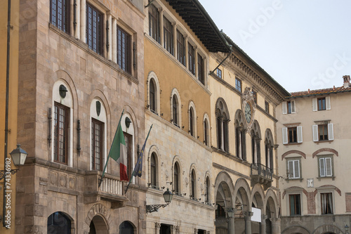 Street with historic buildings in Lucca, Italy