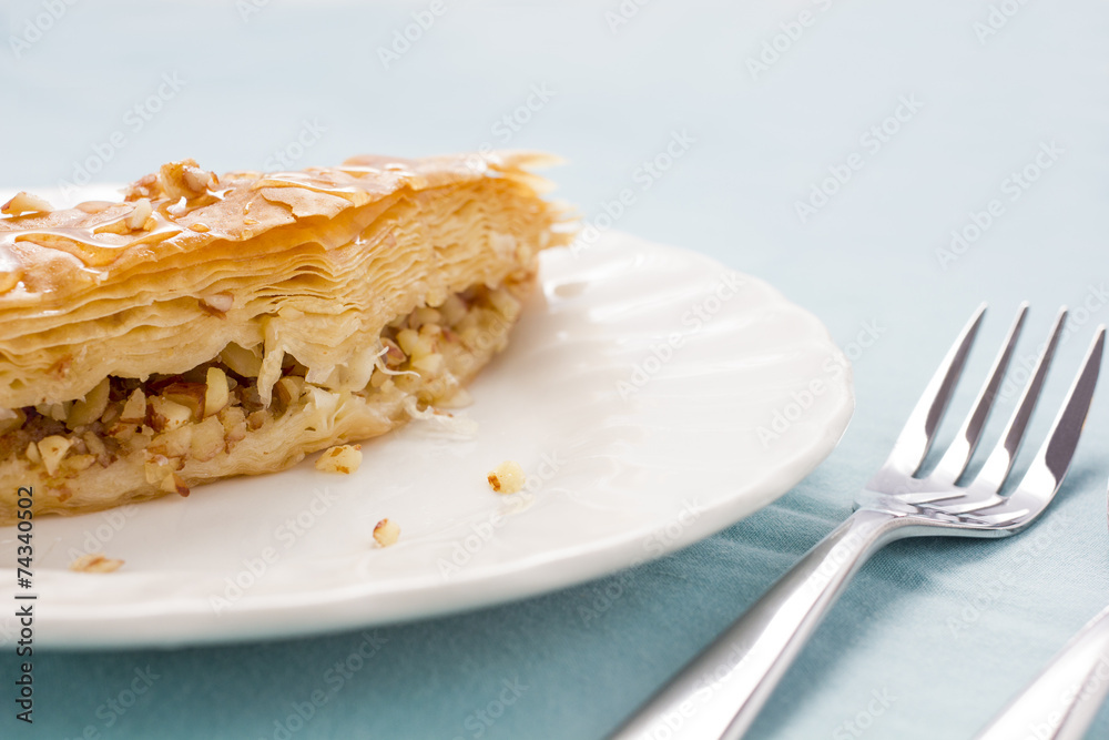Baklava served on a white plate Baklava served on a white plate