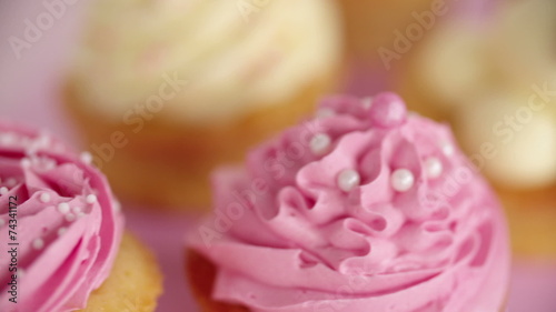 Wallpaper Mural Closeup pan of beautifully decorated pink and white cupcakes Torontodigital.ca