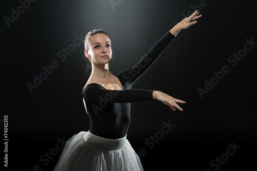Woman Ballerina Ballet Dancer Dancing On Black Background