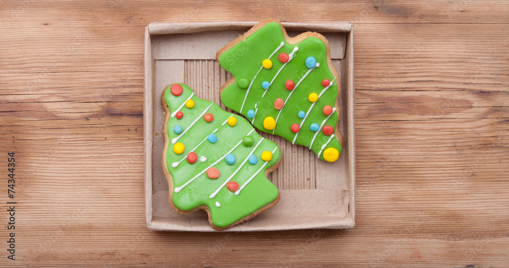 Gingerbread christmas tree on wooden background