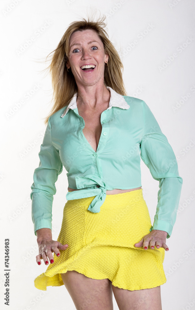 Woman's skirt blowing up in the wind Stock Photo | Adobe Stock