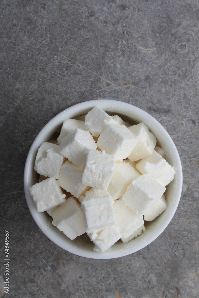 feta goats cheese cubes in dish feta goats cheese cubes in dish