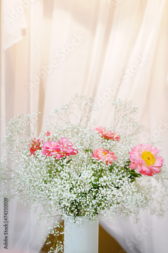 Bright flowers bouquet in vase