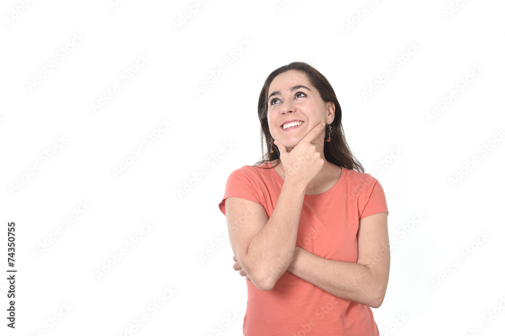 happy Hispanic woman thinking looking up on copy space happy Hispanic woman thinking looking up on copy space