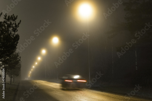 Car in foggy night