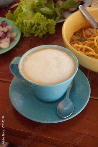Tasty breakfast with  cup of traditional Thai milk tea