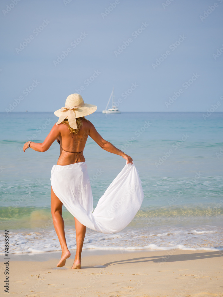 Beautiful woman on the beach.