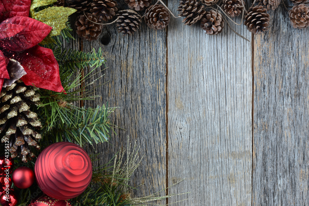 Christmas Decorations with Pine Cones and Rustic Wood Background