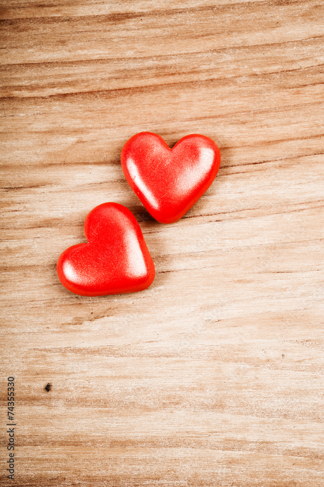 red hearts on wooden background red hearts on wooden background