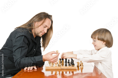 Man and young boy playing