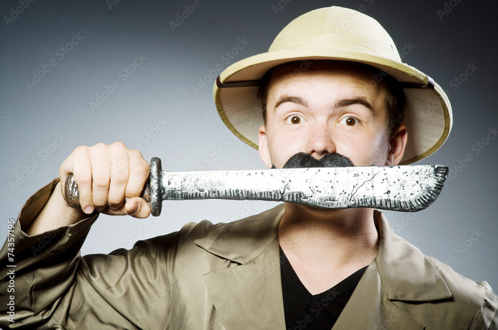 Man in safari hat in hunting concept Man in safari hat in hunting concept