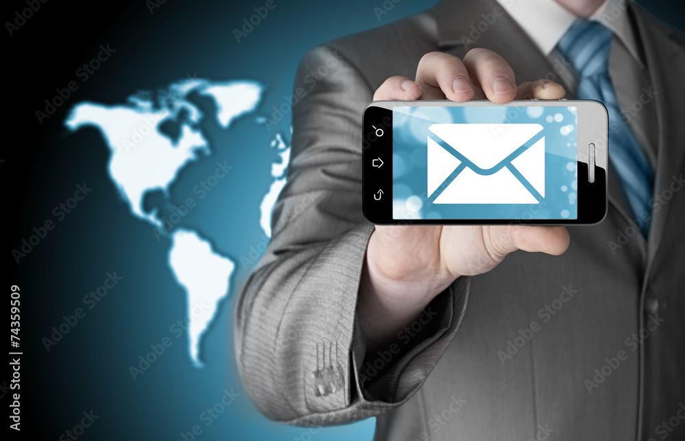 A man holding smartphone with one new message on a screen. A man holding smartphone with one new message on a screen.