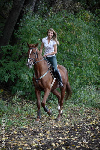 Horseback riding in autumn nature