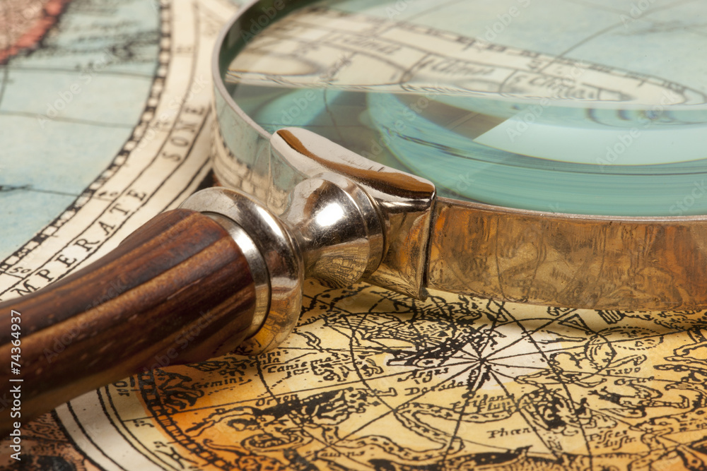 Fototapeta premium Magnifying glass and map
