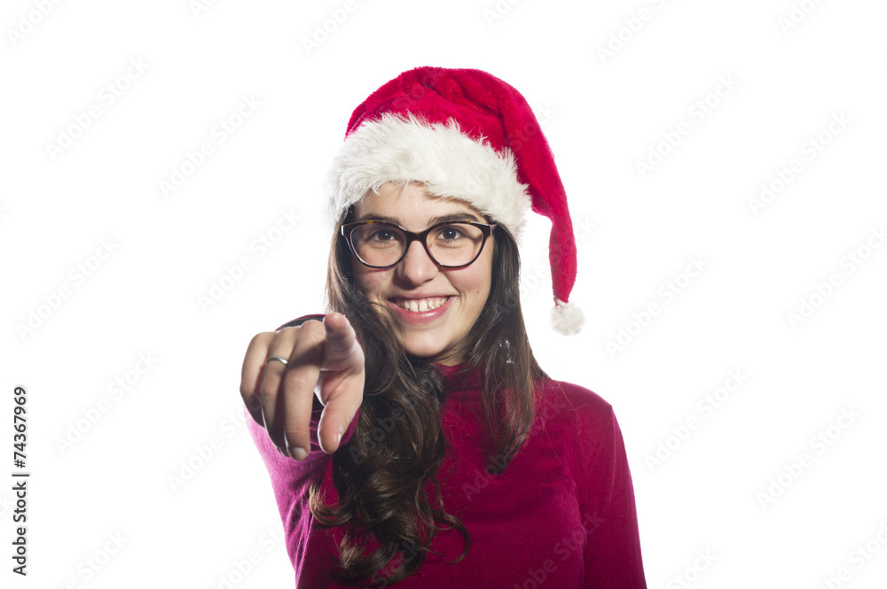 Portrait of a beautiful young woman wearing a santa hat smiling Portrait of a beautiful young woman wearing a santa hat smiling
