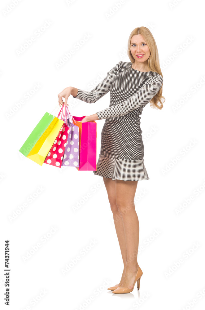 Young woman after shopping isolated on the white