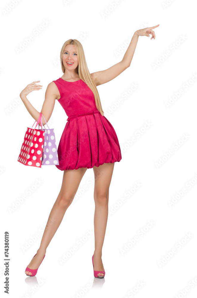 Woman with shopping bags isolated on white