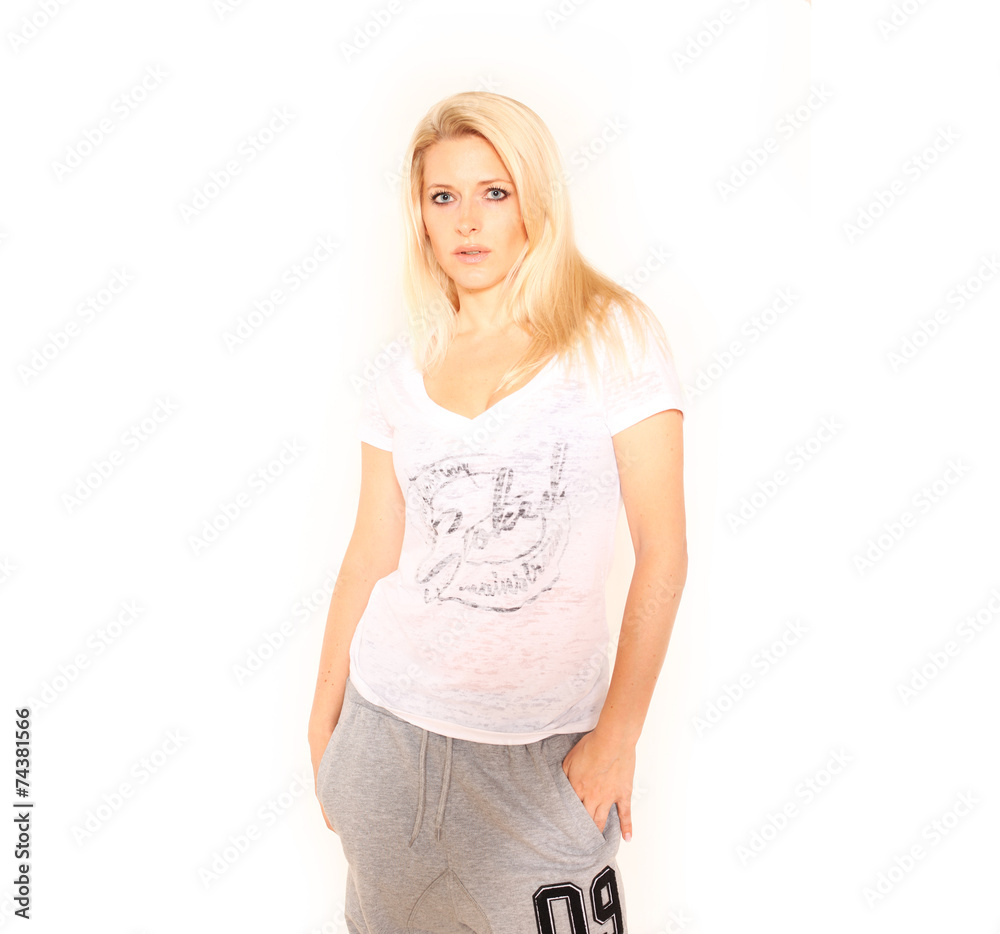 Junge Blondiene in Sportkleidung Junge Blondiene in Sportkleidung