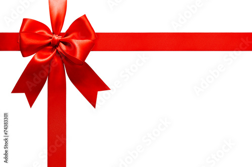 Big red holiday bow on white background