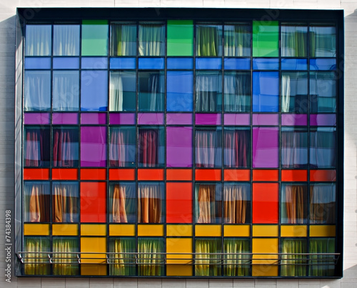 Multi-colored modern apartment building windows