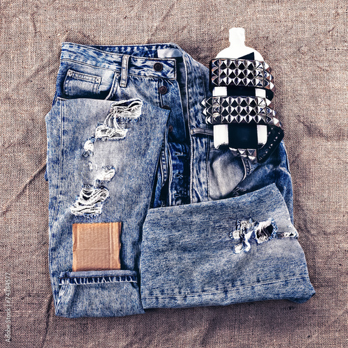 Fashion design photos. Metal grunge style. Vintage blue jeans photo