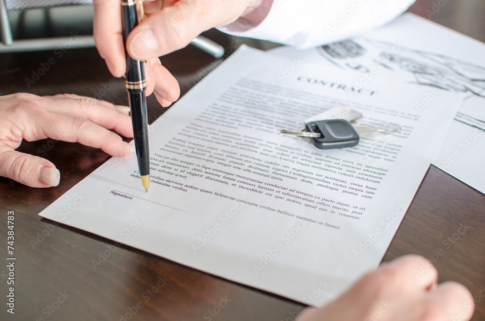 Dealer showing the signature place of a contrac Dealer showing the signature place of a contrac