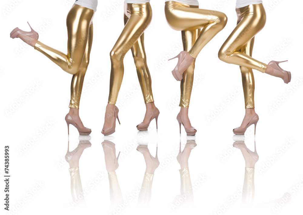 Woman legs isolated on the white background Woman legs isolated on the white background
