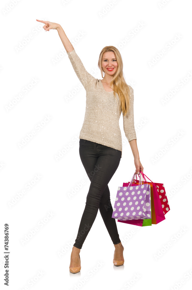 Woman with shopping bags isolated on white