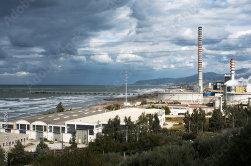 Принти на полотні smokestacks near the coast