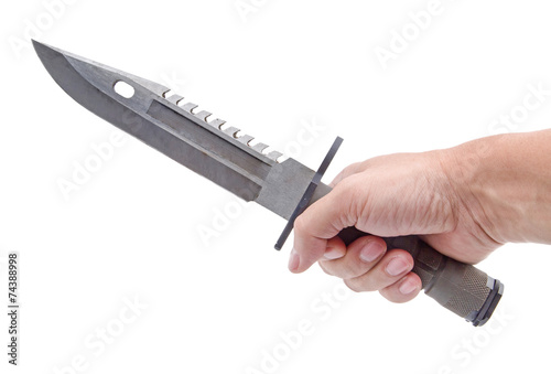 the hand holding Army green of military knife isolated white