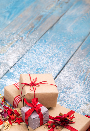 christmas ornament in snow on wood background. studio shot